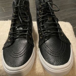 Black leather high top Vans. Men’s 5-women’s 6.5